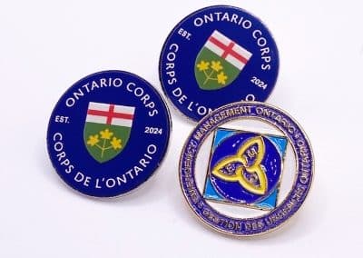 Enamel pins by the best corporate identity collateral agency in Toronto